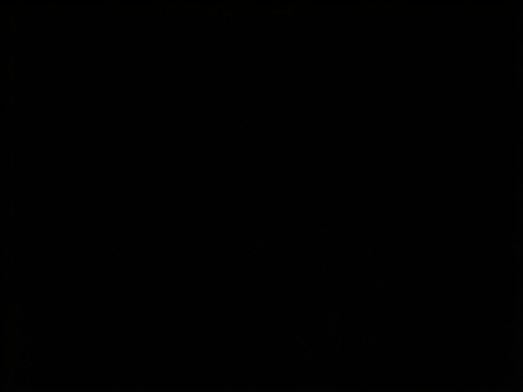 a silhouette of a person sleeping peacefully in a dark room, with soft, glowing light